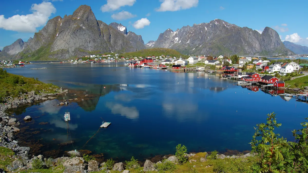 Fishing village on a Norwegian fjord at sunset